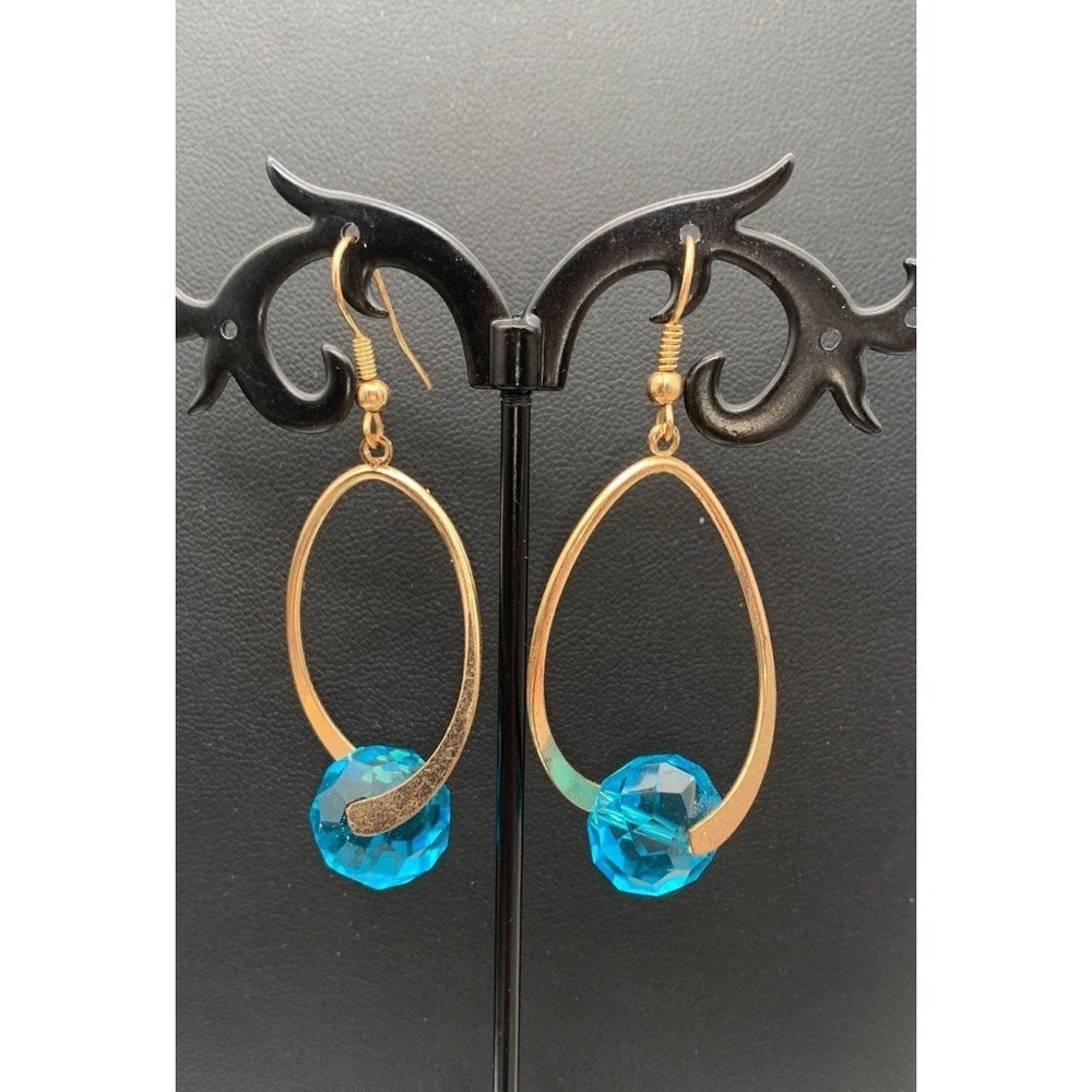 Gold Tone Dangle Earrings With An Aqua Blue Faceted Glass Crystal Drop Pierced